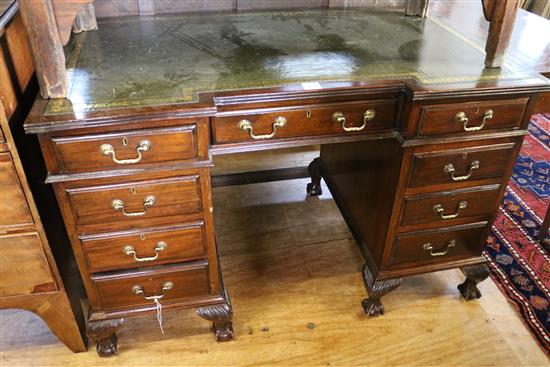 George III style mahogany inverted breakfront pedestal desk on ball & claw feet(-)